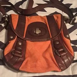 Fifty four fossil 2 color pocket book orange n brown